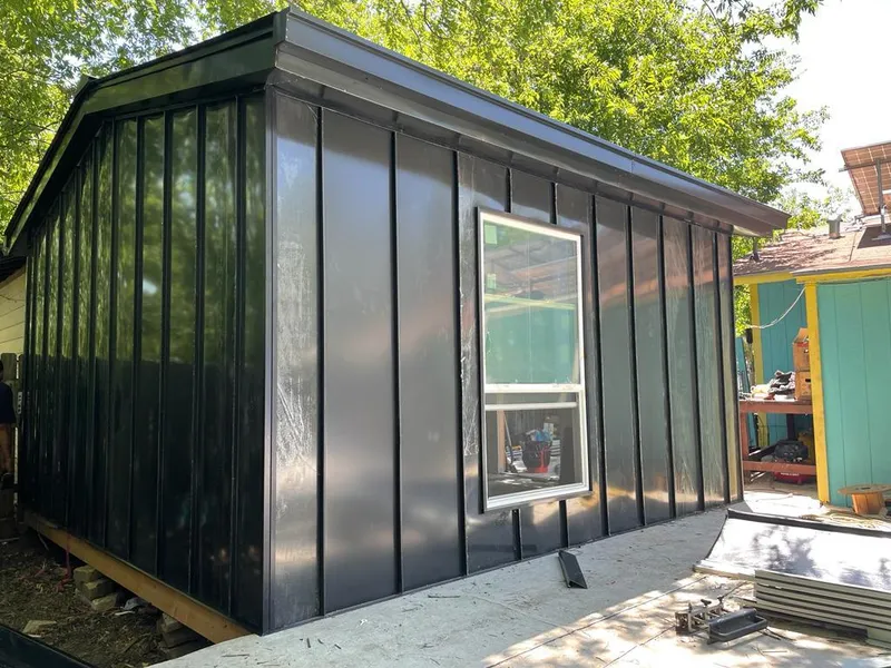 Black standing seam metal wall panels for Roof Inspection in Laurel Hill