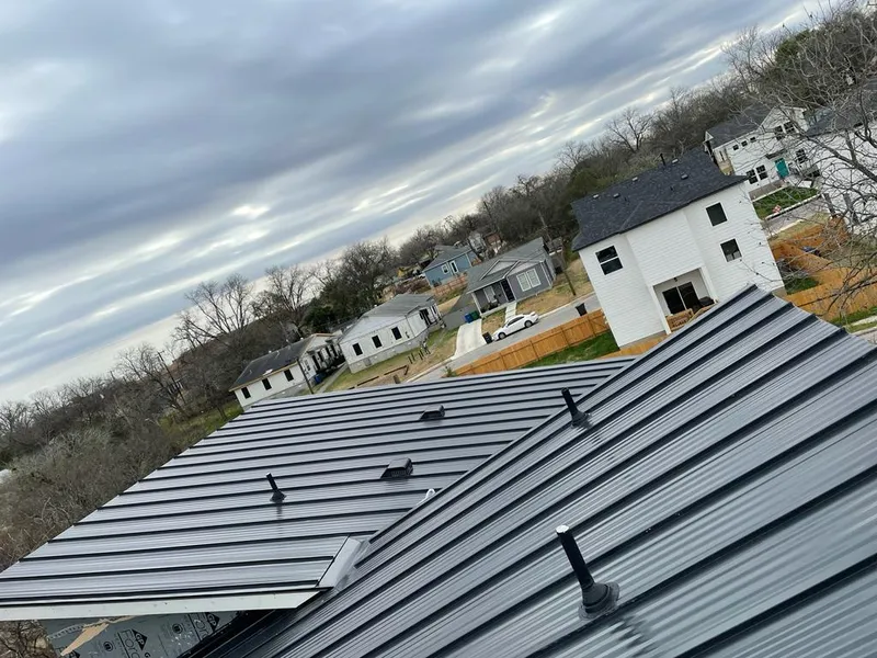 Standing seam metal roof panels with vents for Skylight Repair in Laurel Hill